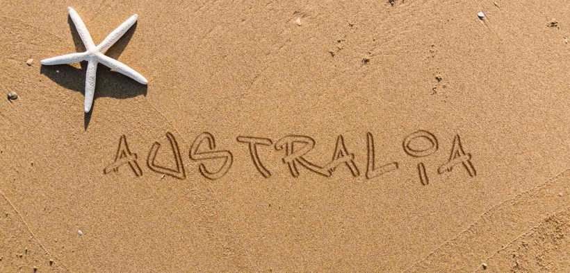 napis Australia na plaży, powyżej rozgwiazda